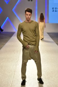 Knitwear sweatshirt. Thing which made this sweatshirt different is small zipper on the back. With extra long sleeves this is very fashionable statement.